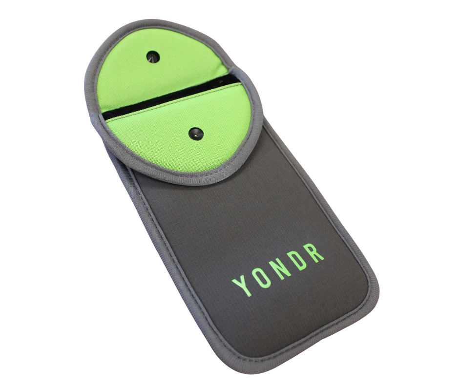 A dark gray and bright green Yondr pouch.